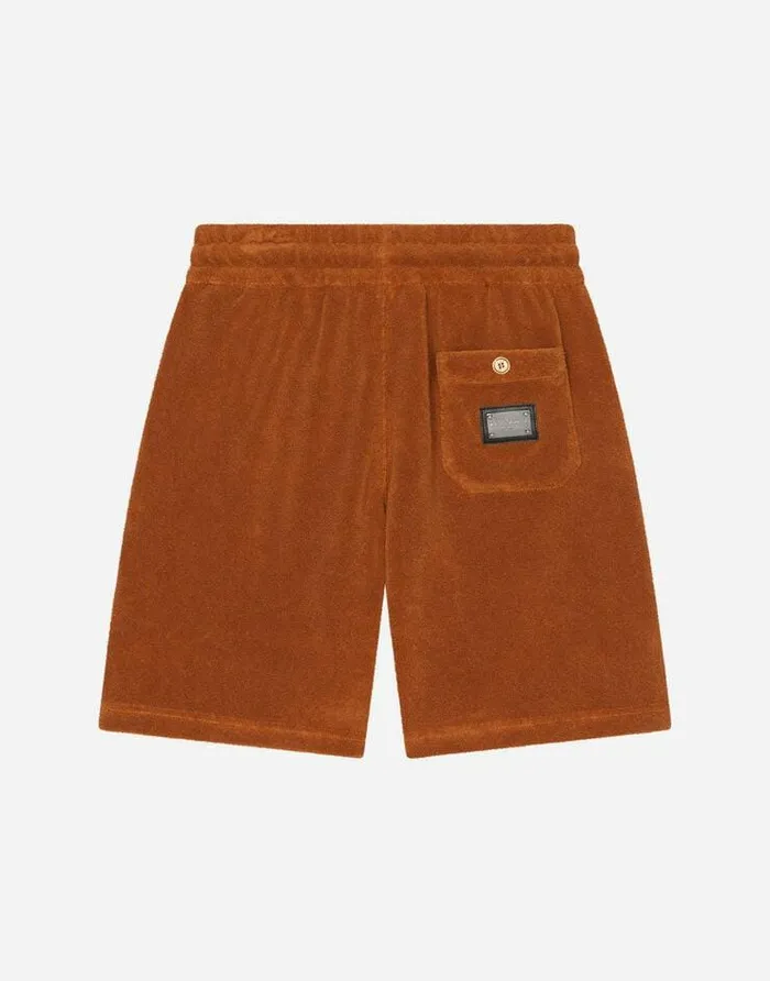 Dolce and Gabbana Trousers And Shorts Children Terrycloth Shorts With Logo Tag Brown Dolce and Gabbana Trousers And Shorts Children Terrycloth Shorts With Logo Tag Brown